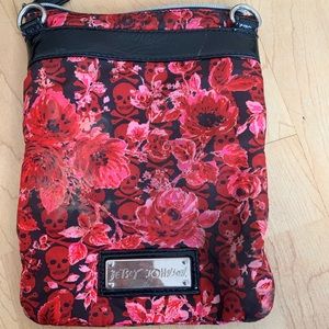 Betsey Johnson handbag. Flower and skulls design.